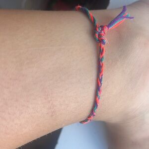 Braided threaded bracelet/ anklet.